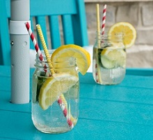 refreshing glass of water with lemon and lime