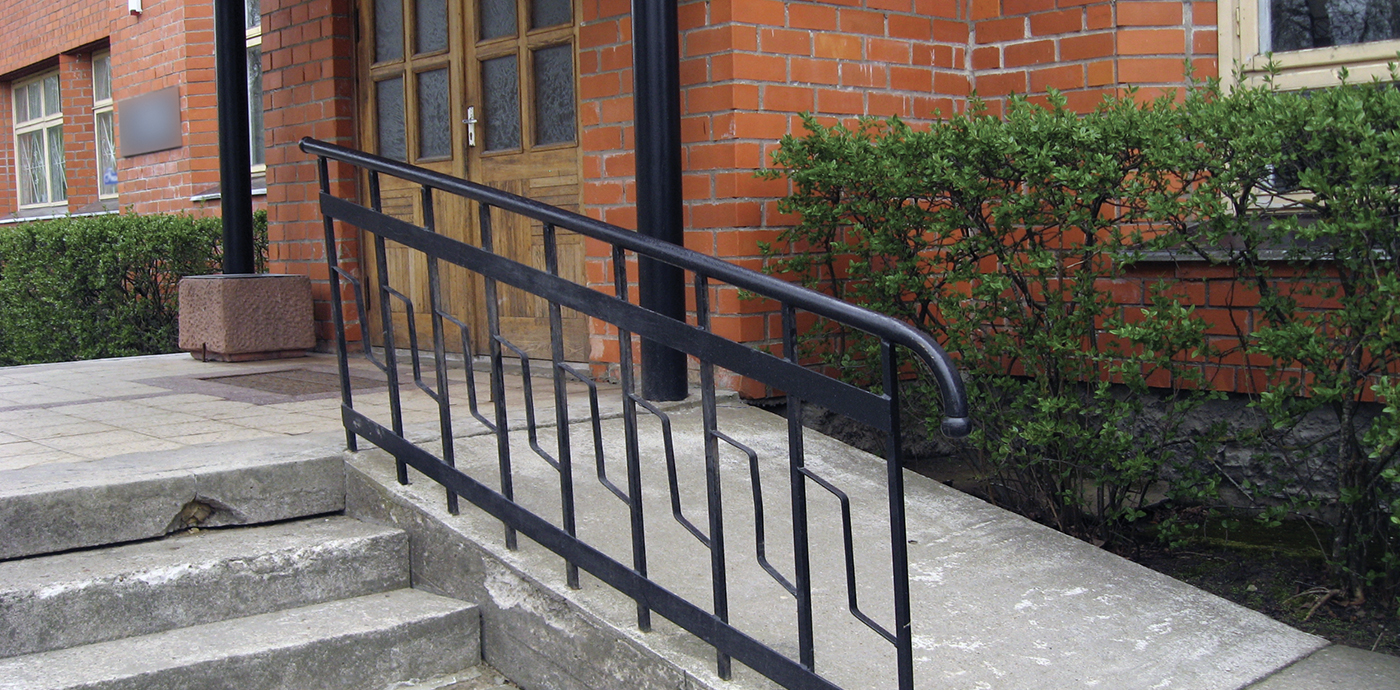 Photo of ramp in front of housing complex.