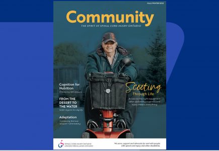 Magazine cover of SCIO community member riding his scooter.