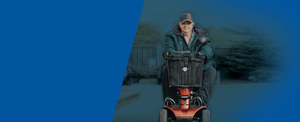 Frank Walker on his scooter.