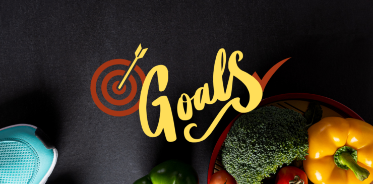 Image of heathy food and running shoes against a starck black background with the words, "Goals" written across the image.