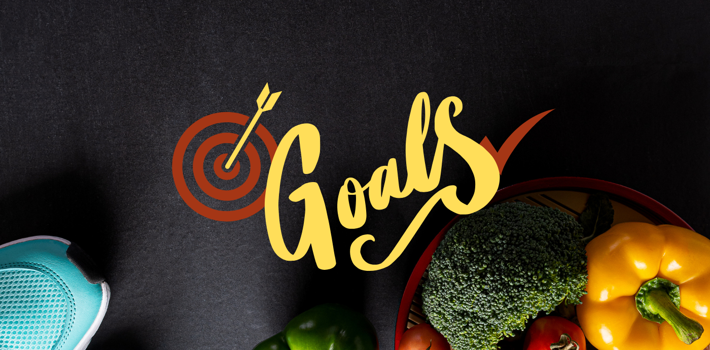 Image of heathy food and running shoes against a starck black background with the words, "Goals" written across the image.